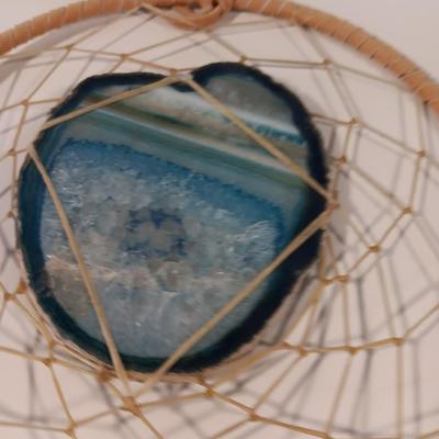 Two hand painted Native American Sand dollars with a dreamcatcher with blue Agate in center