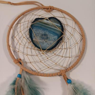 Two hand painted Native American Sand dollars with a dreamcatcher with blue Agate in center