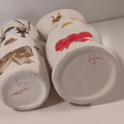 Two ceramic painted art vases