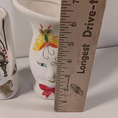 Two ceramic painted art vases