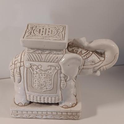 Vintage tabletop ceramic elephant plant stand with smaller chalkware elephant.