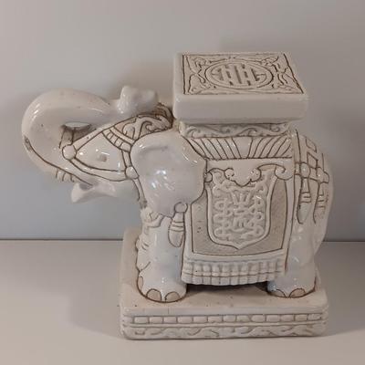 Vintage tabletop ceramic elephant plant stand with smaller chalkware elephant.