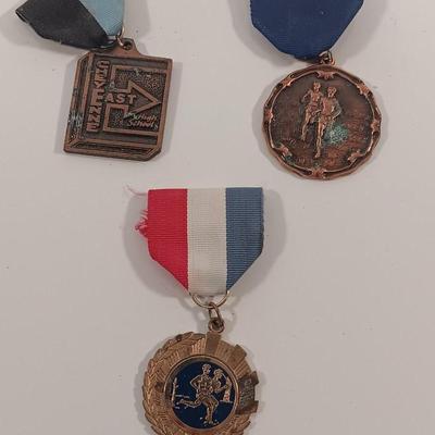 Three vintage medals