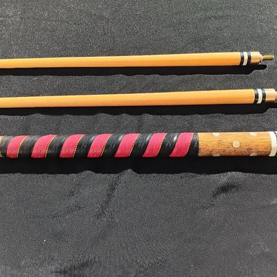 Vintage red and black pool cue with pearl white dots - turns into 2 different sizes
