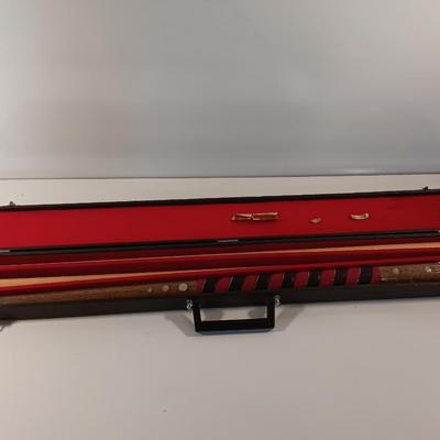 Vintage red and black pool cue with pearl white dots - turns into 2 different sizes