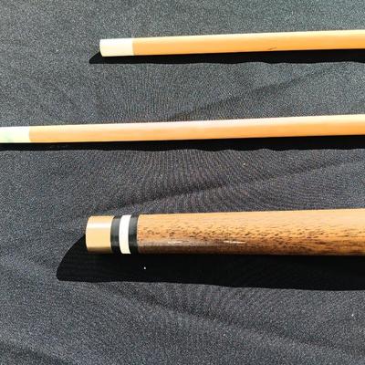 Vintage red and black pool cue with pearl white dots - turns into 2 different sizes