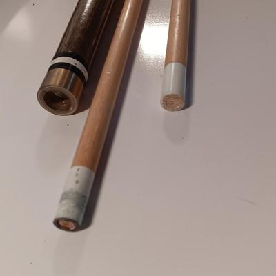 Vintage red and black pool cue with pearl white dots - turns into 2 different sizes