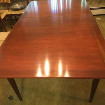 MCM wood diningroom table with pads and leaves