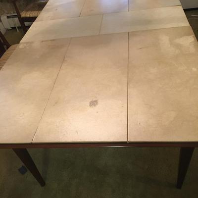 MCM wood diningroom table with pads and leaves