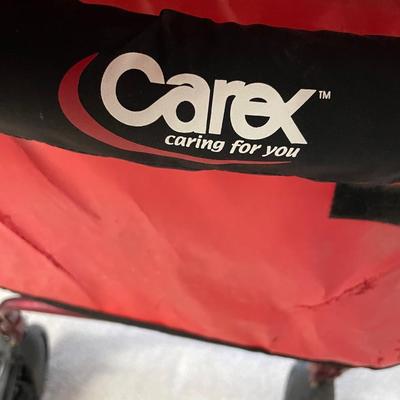 Red walker with seat