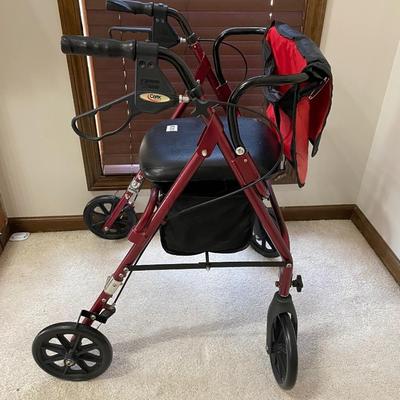 Red walker with seat