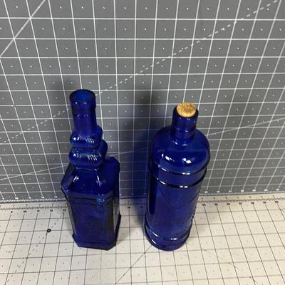 2 Blue Glass Bottles 