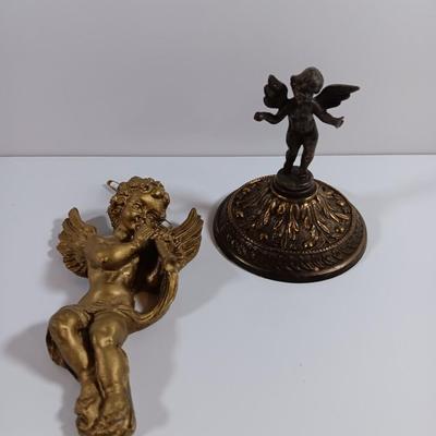 TWO cherub Decorative Antiques. One chalkware wall art and one brass colored decorative piece