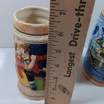 Two barware Beer mugs Steins one marked Japan and the other is a San Francisco souvenir.