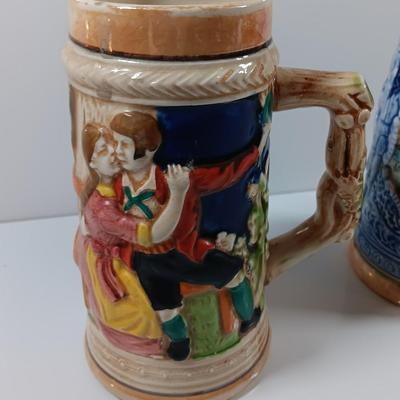Two barware Beer mugs Steins one marked Japan and the other is a San Francisco souvenir.