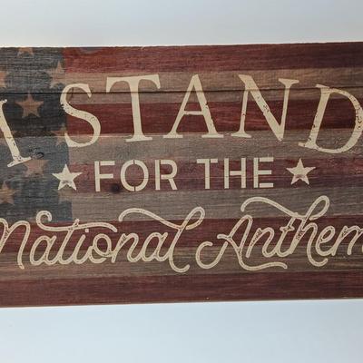 Wooden wall art I Stand FOR THE NATIONAL ANTHEM with American flag background..