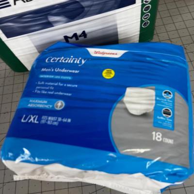 2 Packages of Adult Diapers Large and Medium