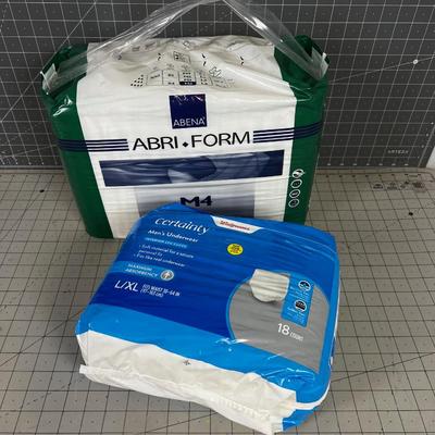 2 Packages of Adult Diapers Large and Medium