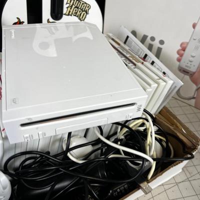 The Wii Deal: Plus lot of Games, Players, Controllers, Guitars 