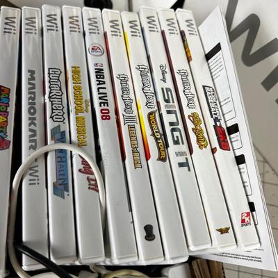 The Wii Deal: Plus lot of Games, Players, Controllers, Guitars 