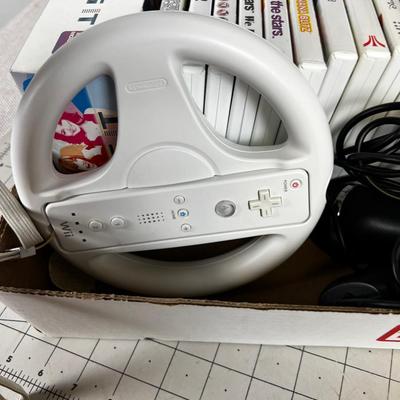 The Wii Deal: Plus lot of Games, Players, Controllers, Guitars 