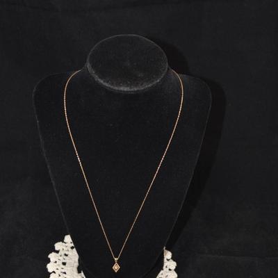 14k 20" Chain with 14k Diamond Chip Pendant 1.4g