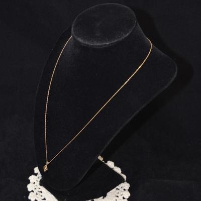 14k 20" Chain with 14k Diamond Chip Pendant 1.4g