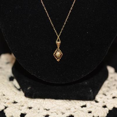 14k 20" Chain with 14k Diamond Chip Pendant 1.4g