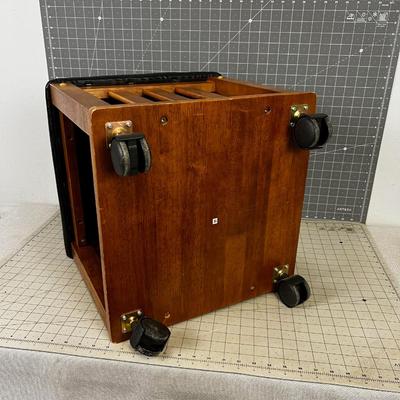 Black and Brown Rolling Foot Stool. 