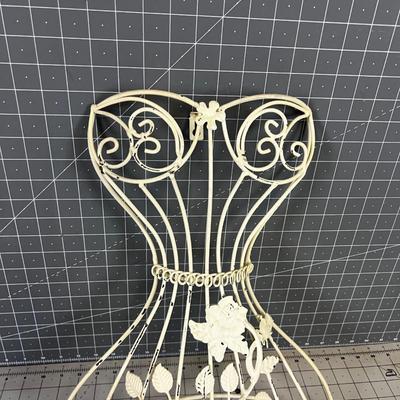 Wrought Iron Wall DÃ©cor' Looks like a dress form