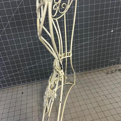 Wrought Iron Wall DÃ©cor' Looks like a dress form