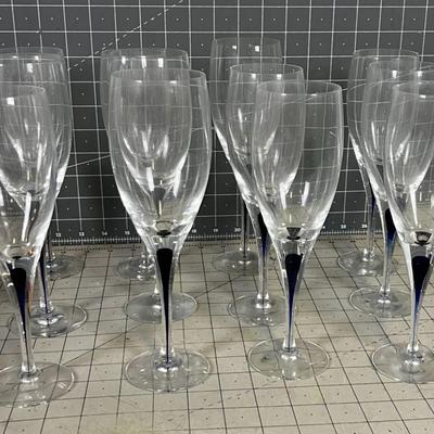 Orrefors Sweden  Hand Blown Crystal Wine Glasses with a Blue Drop inside the Stem. 