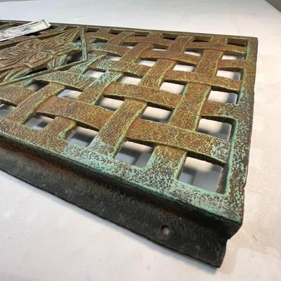 CAST IRON GRATE WITH FLORAL AND BASKET WEAVE DESIGN