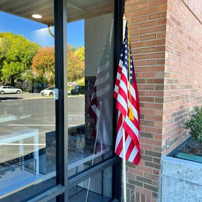 LARGE U.S. FLAG WITH GOLD BRAID TASSLES ON POLE