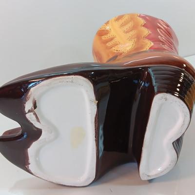 Cowboy boots and hat ceramic cookie jar