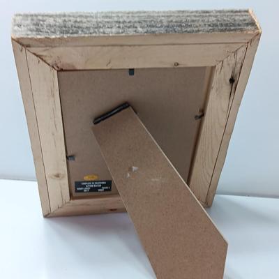 The Olde West picture frame and a barn wood picture frame