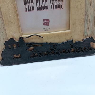 The Olde West picture frame and a barn wood picture frame