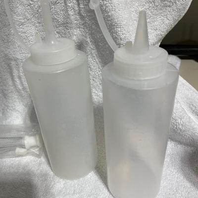 2 food tents and squirt bottles