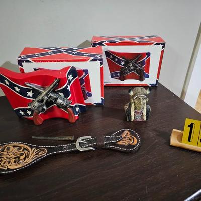 Two rebel flags, tooled leather piece, indian statue