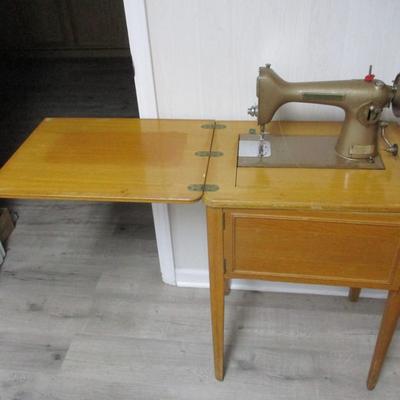 Vintage New Home Sewing Machine and Cabinet - H
