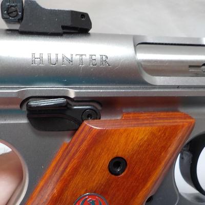 " Ruger Mark 1V Hunter , 22 cal pistol"' est. $500 to $810.