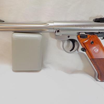 " Ruger Mark 1V Hunter , 22 cal pistol"' est. $500 to $810.
