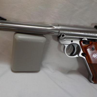 " Ruger Mark 1V Hunter , 22 cal pistol"' est. $500 to $810.
