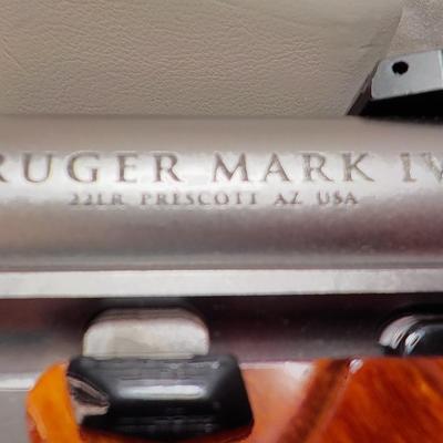 " Ruger Mark 1V Hunter , 22 cal pistol"' est. $500 to $810.