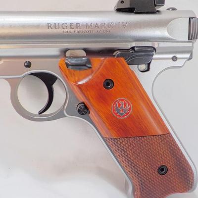 " Ruger Mark 1V Hunter , 22 cal pistol"' est. $500 to $810.