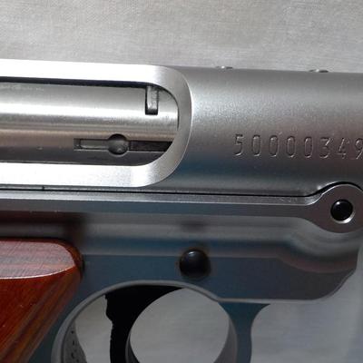 " Ruger Mark 1V Hunter , 22 cal pistol"' est. $500 to $810.