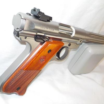 " Ruger Mark 1V Hunter , 22 cal pistol"' est. $500 to $810.
