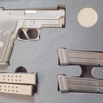 " Sig P 229 Legion Pistol" with case and Mags. est $700 to $1300. (new)