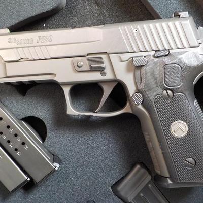 " Sig P 229 Legion Pistol" with case and Mags. est $700 to $1300. (new)