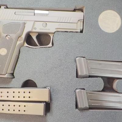 " Sig P 229 Legion Pistol" with case and Mags. est $700 to $1300. (new)